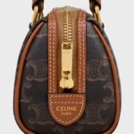 MINI BOSTON IN TRIOMPHE CANVAS AND CALFSKIN