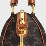 SMALL BOSTON IN TRIOMPHE CANVAS AND CALFSKIN